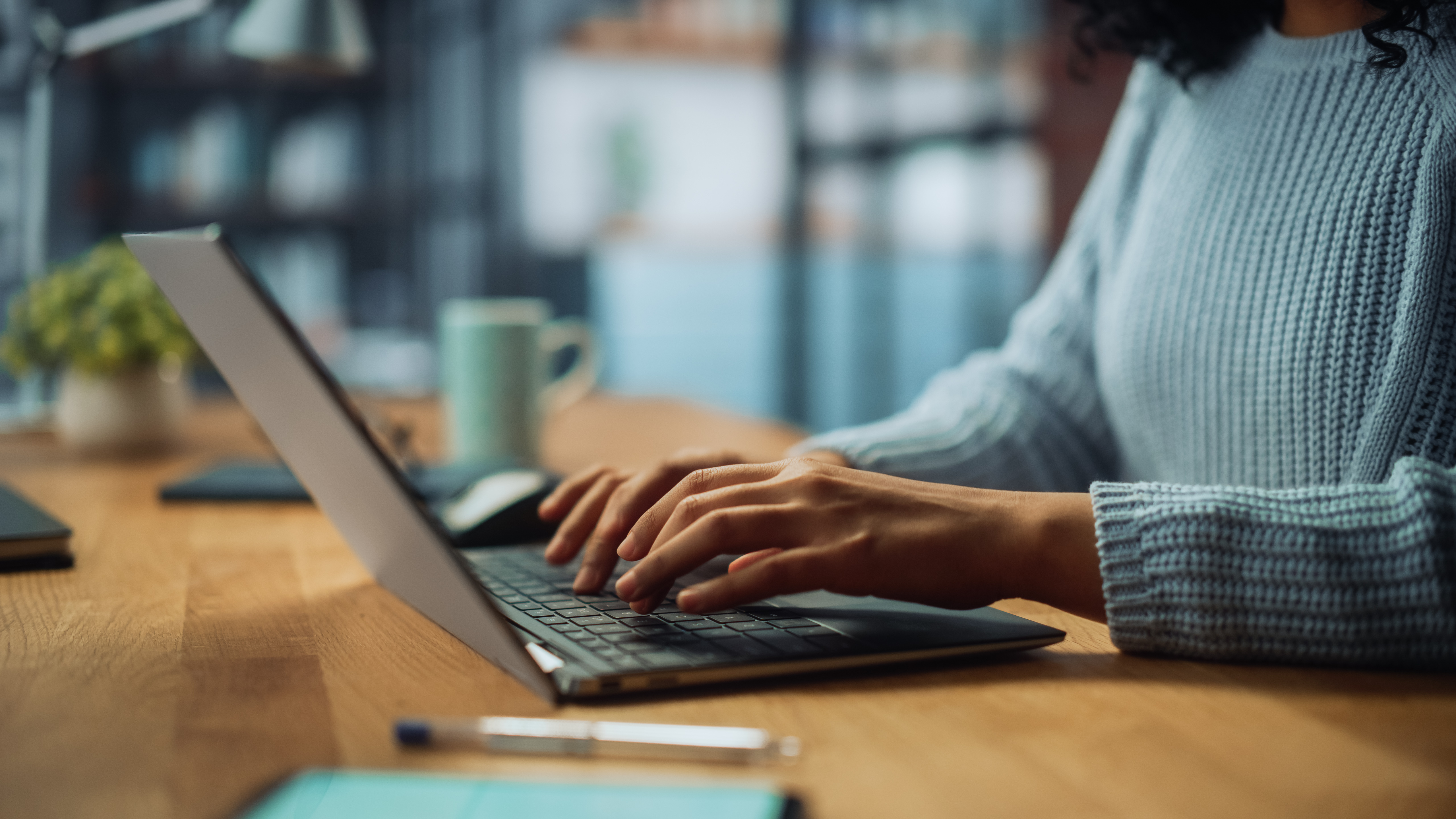 Woman sitting at a laptop